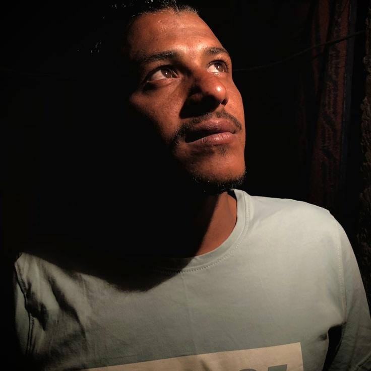 Kaveri Mehta, Lead Design Curator at PlanetCornerSteady, reviewing corporate floral arrangements